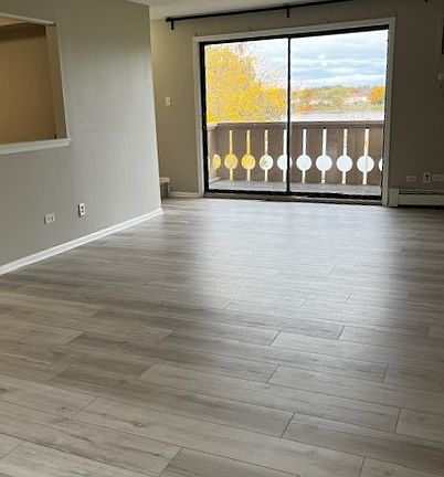 Recently renovated with laminate flooring.