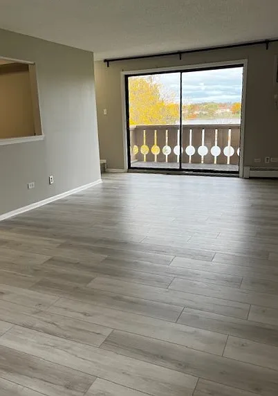 Recently renovated with laminate flooring.