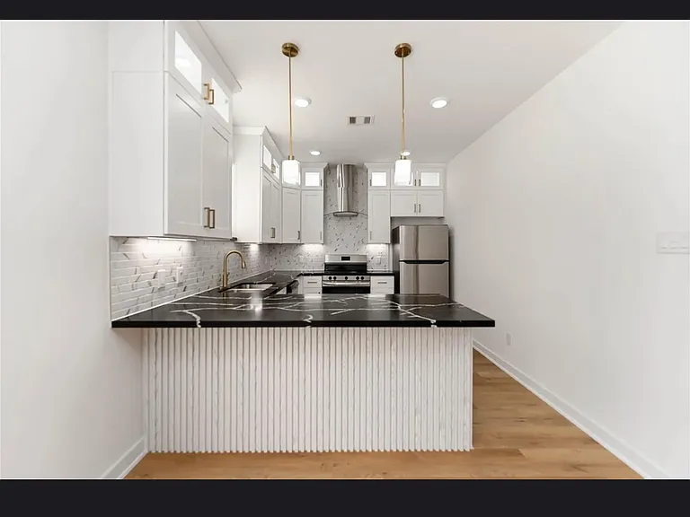 7809 Queen St — Photo 5
