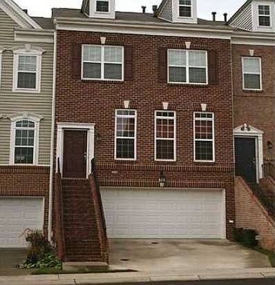 Front of the house. Room for four cars.