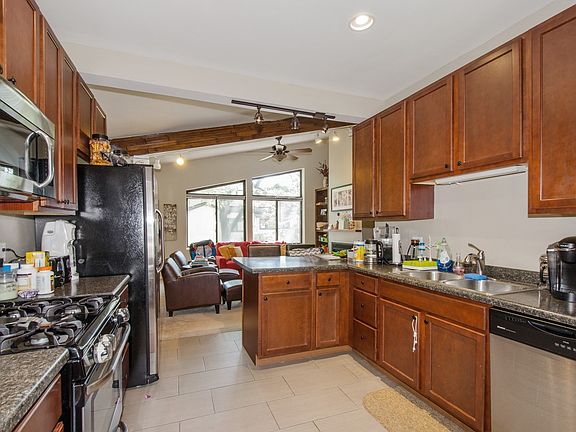 Updated kitchen overlooks the LR
