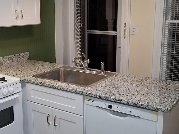 Kitchen with granite countertops and brand new everything and dishwasher right by the sink