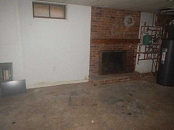 Second Fireplace located in unfinished