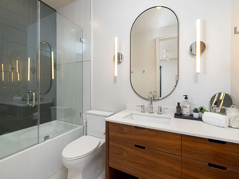 Primary bathroom- tall step in shower/tub combo