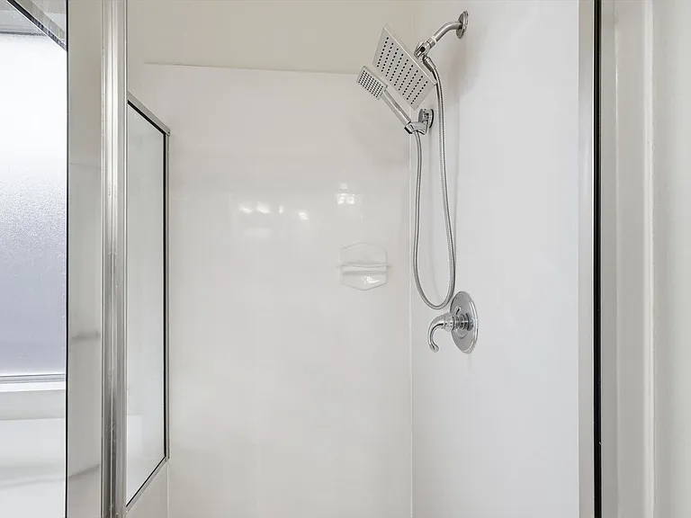 And the shower area with luxury rain shower head