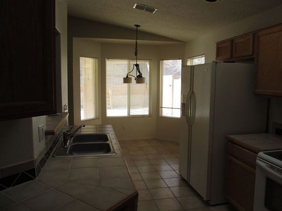 5th image of 9715 Triana Pl NW