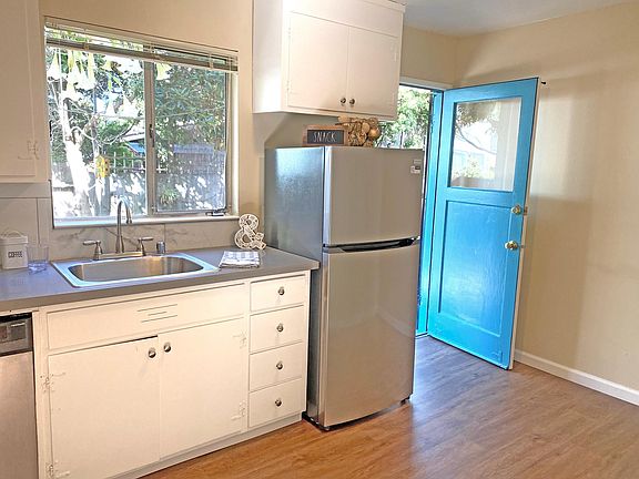 Kitchen with door to back patio