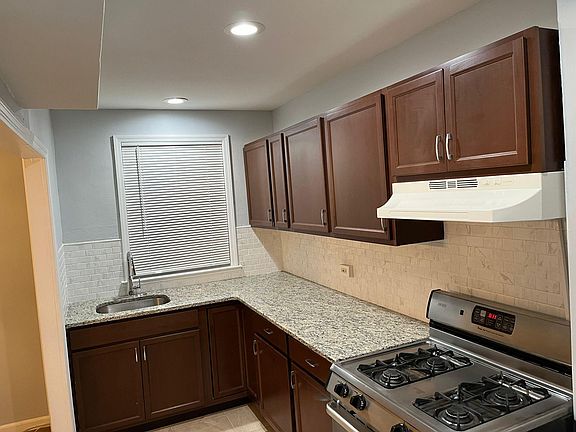 Kitchen with sink window looking over the garden