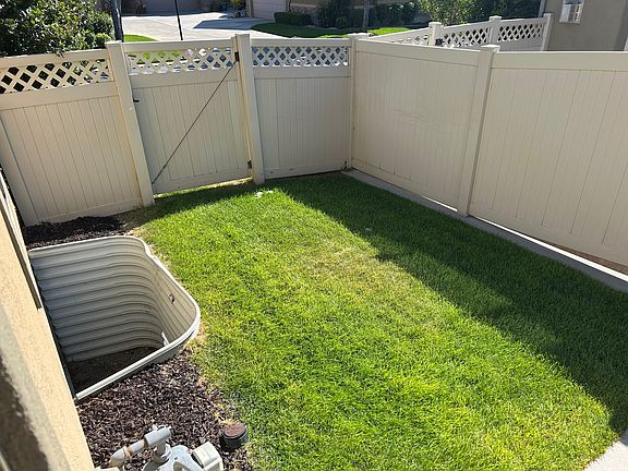 There is also a patio area next to the grass