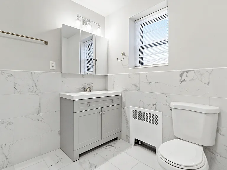 Experience luxury in this elegantly designed bathroom featuring contemporary fixtures.
