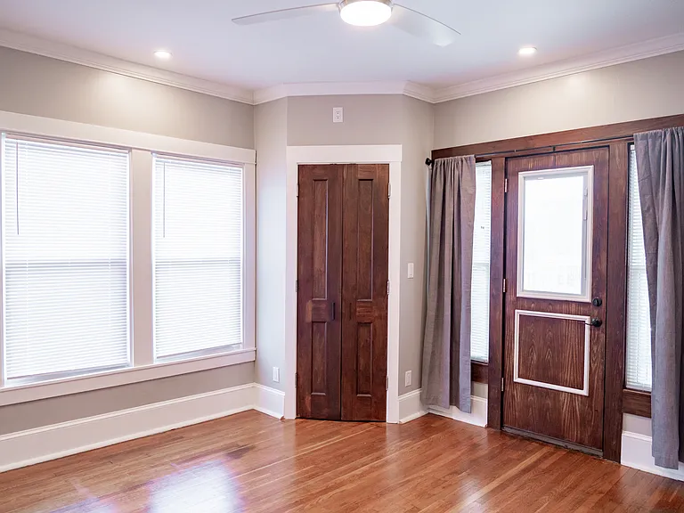 Master bedroom with door to balcony.
