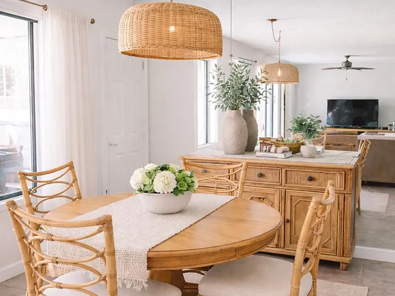 Dinning Room with Entertaining Closet and window that overlooks the sunroom.