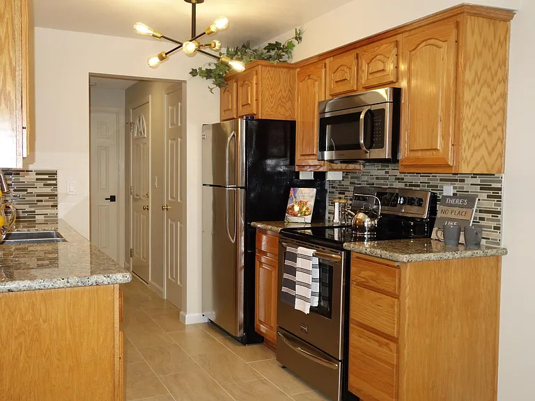 Modern Kitchen with Stainless Steel Appliance Package
