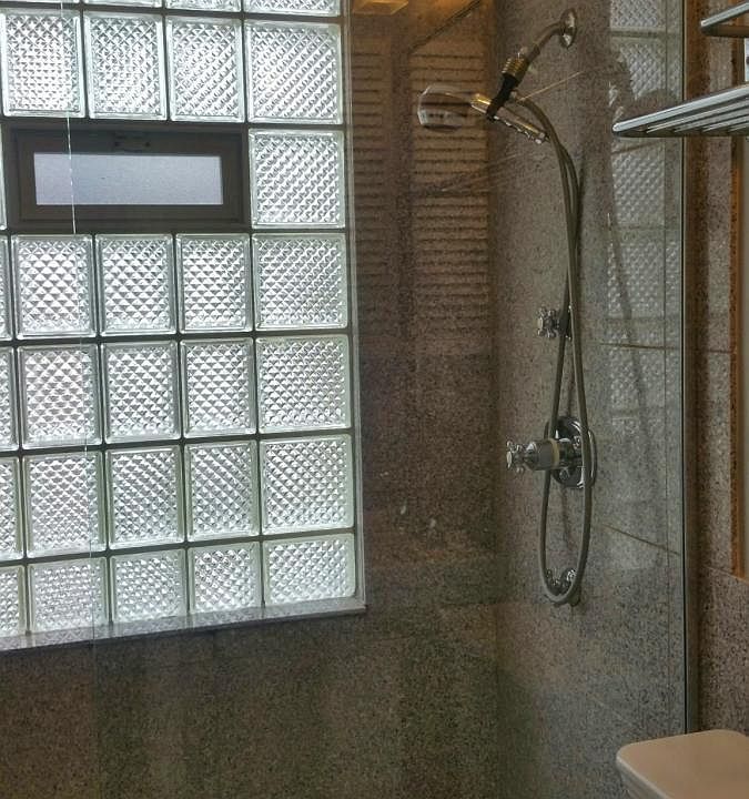 Granite shower with rain head