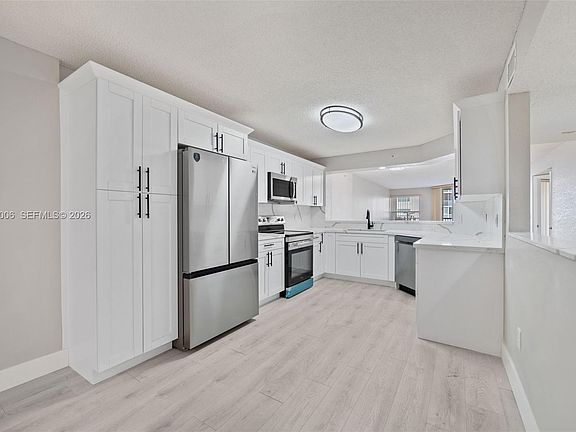5th image of 7641 Granville Dr #209