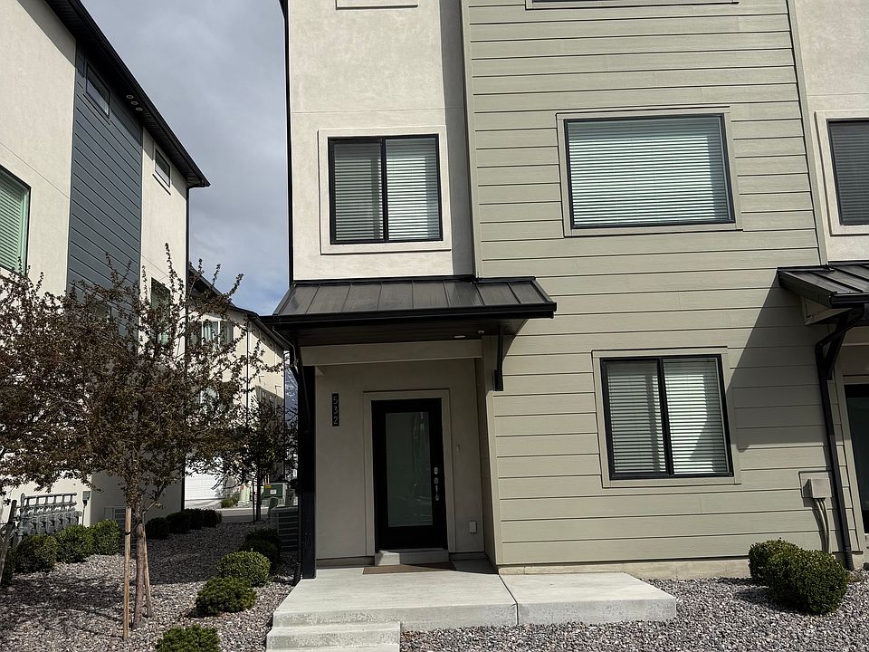 Front of townhome, end unit. Lots of natural light with big windows.