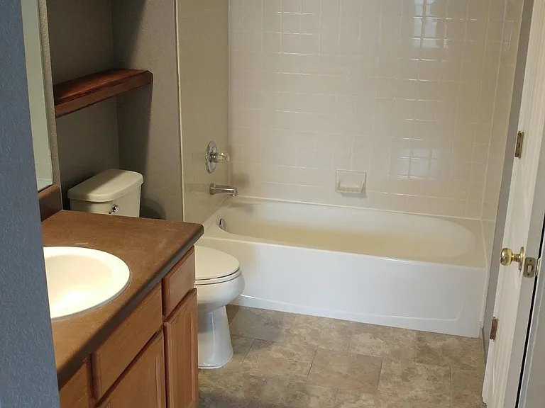 Primary Bathroom with step in closet
