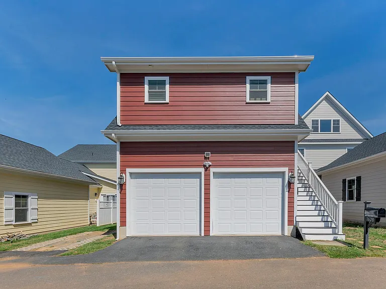 Rear of the house, garage and carriage house apartment.