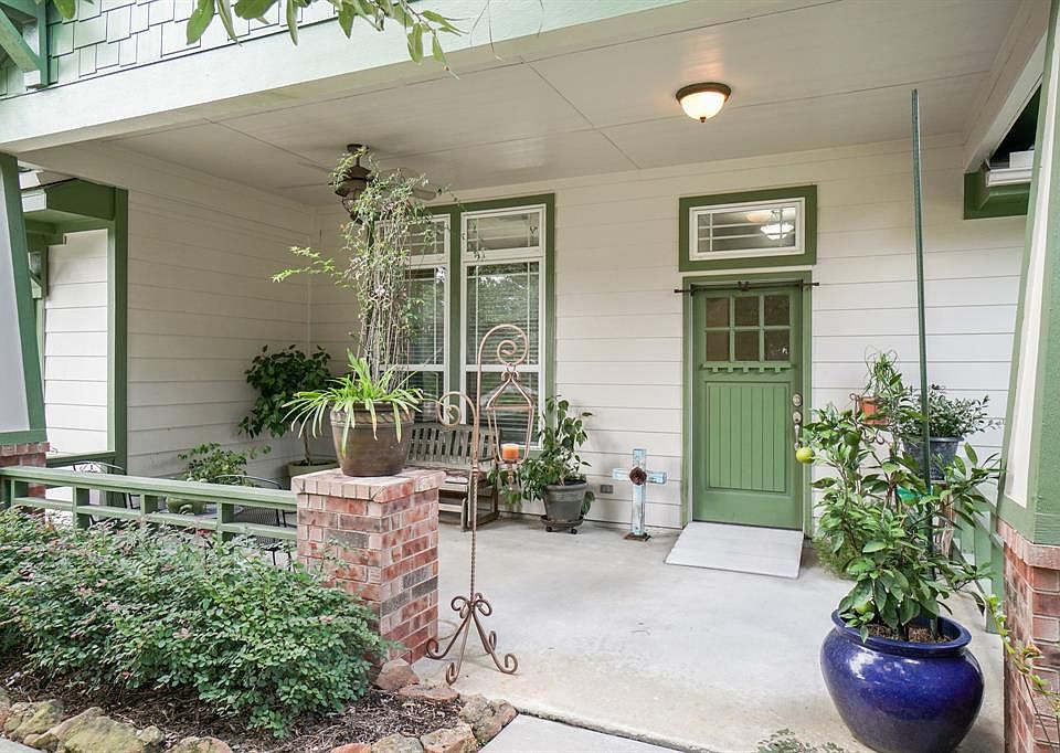 Welcome Home! This front porch is both warm and inviting. Plenty of space to relax and enjoy time with neighbors.