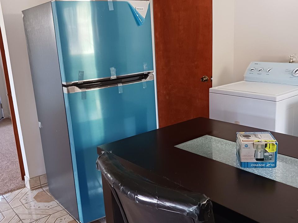 The kitchen has two entries. You can enter the kitchen from the hallway and the living room area.