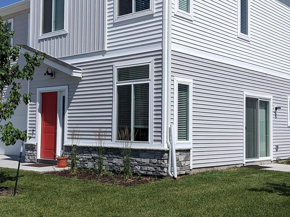 side view. corner unit with small patio