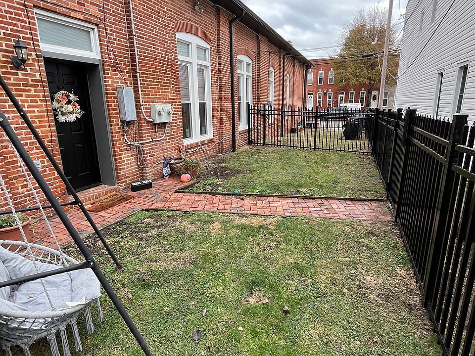 View of Front Door within Newly Fenced Private Yard