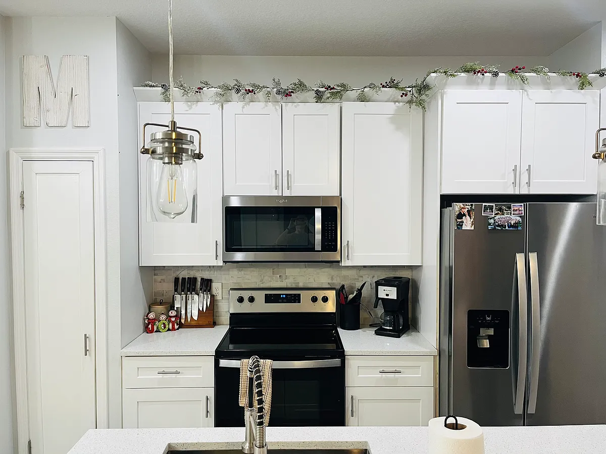 Kitchen with quartz counter and beautiful stainless appliances. - 1221 3rd St