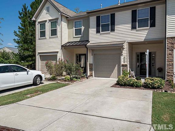 This Home will wow you!! Many Many upgraded features throughout this nearly new home! Single Car garage with two parking pads in addition to many guest parking available around the neighborhood! The Garage has a smooth epoxy flooring and in addition to be