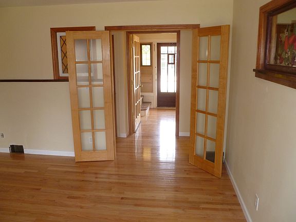 French doors accent the entryway and living room