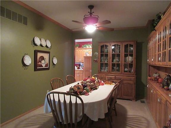 FORMAL DINNING ROOM WITH FULL WALL OF  BUILT IN CHINA CABINET