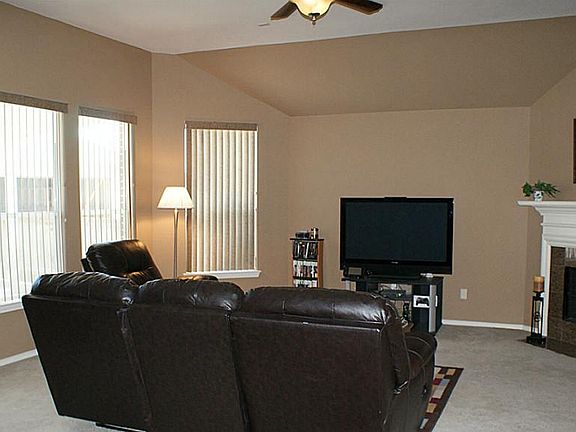 Spacious sun lit family room wired for surround sound!