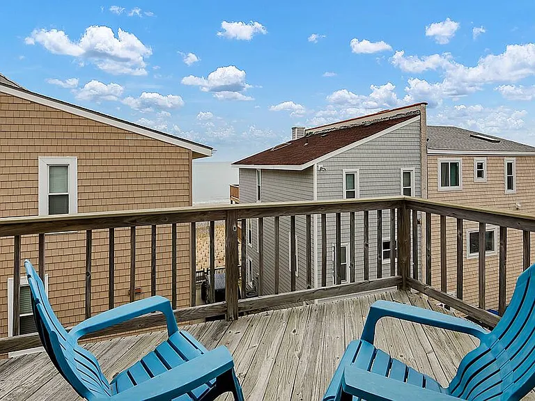 2 balconies for beach views- one off the master bedroom and one off the living room. 30 second walk to beach!
