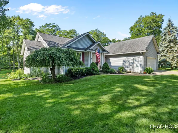 9737 Sandgrove Dr NE, Sparta, MI 49345