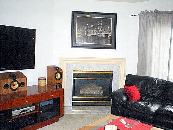 Living Room w/corner Fpl.