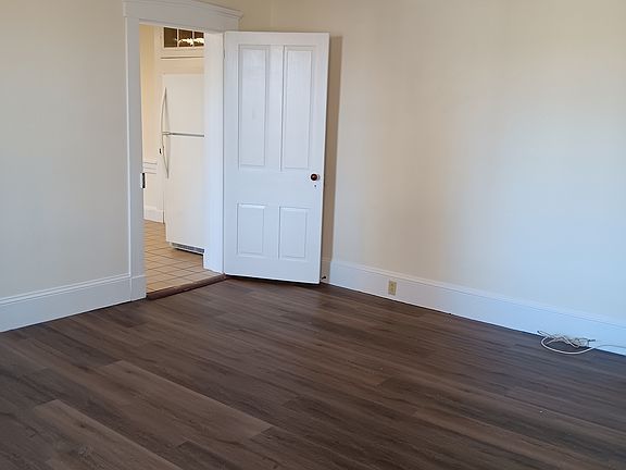 Living area, doorway to kitchen