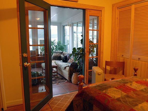 Sunroom seen from back bedroom.