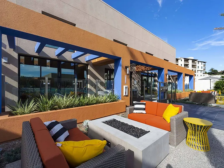 Gather around the fire pit with comfortable outdoor seating, perfect for cozy evenings and great conversations.