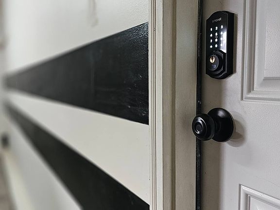 Private entrance through garage.