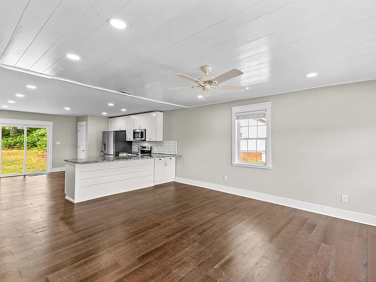 Open living area, kitchen and dining area.