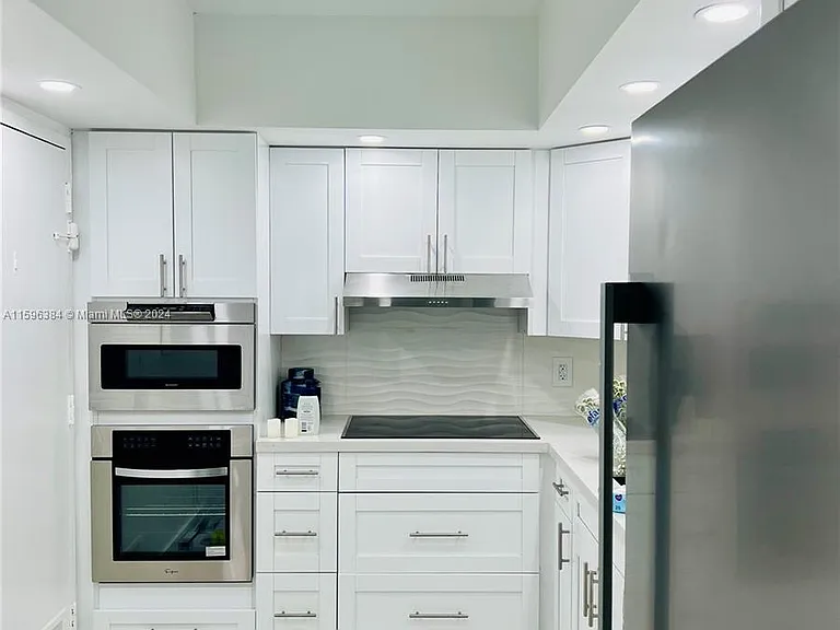 400 Kings Point Dr #307 — Photo 20