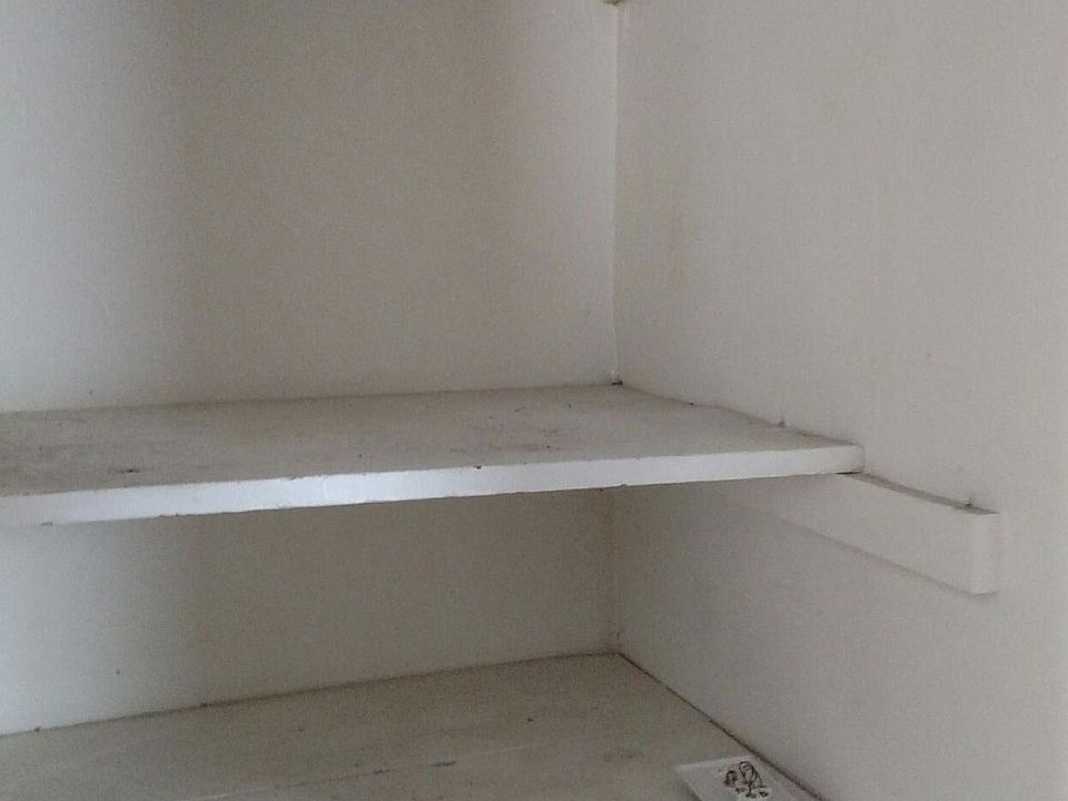 EXTRA SHELVES IN SAMLL HALLWAY