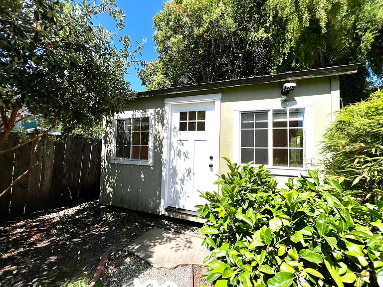 9 x 13-foot detached shed in backyard