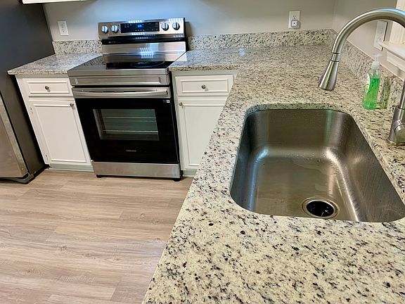 Granite Countertops and large sink!