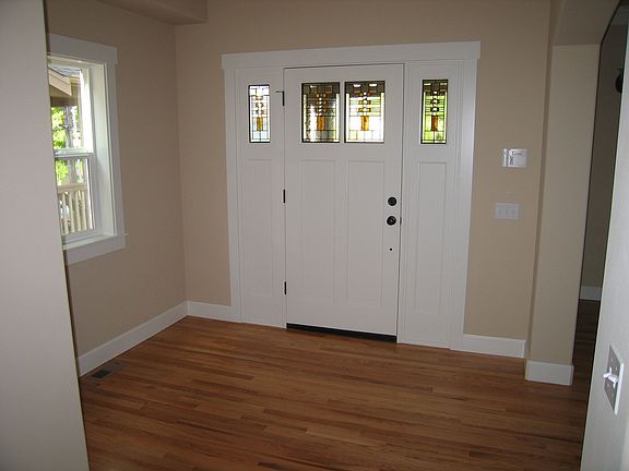large front foyer with front door