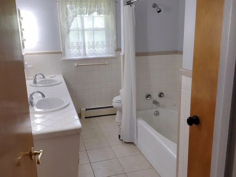 2nd floor full bathroom, now with updated hardware and a rain shower