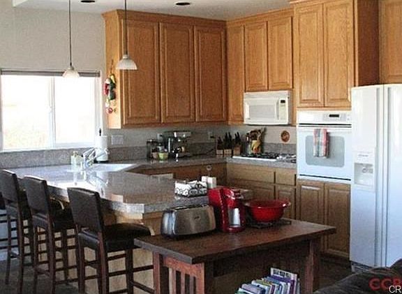 Warm and welcoming with something good to eat on the stove.  It'