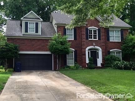 8948 Magnolia Estates Drive
						:
						Full Brick front exterior with 2-car garage