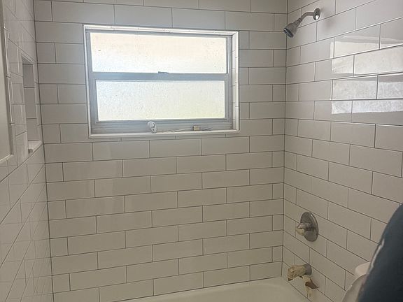 new tile, toilet and vanity