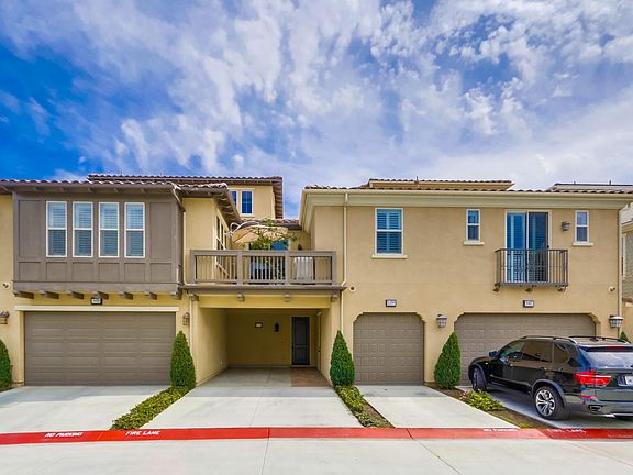 Carport, attached garage & additional street parking. Fits up to four cars comfortably