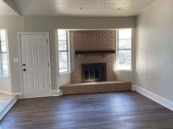 New laminate wood for the living room and hall for that rich cozy feel and easy maintenance!